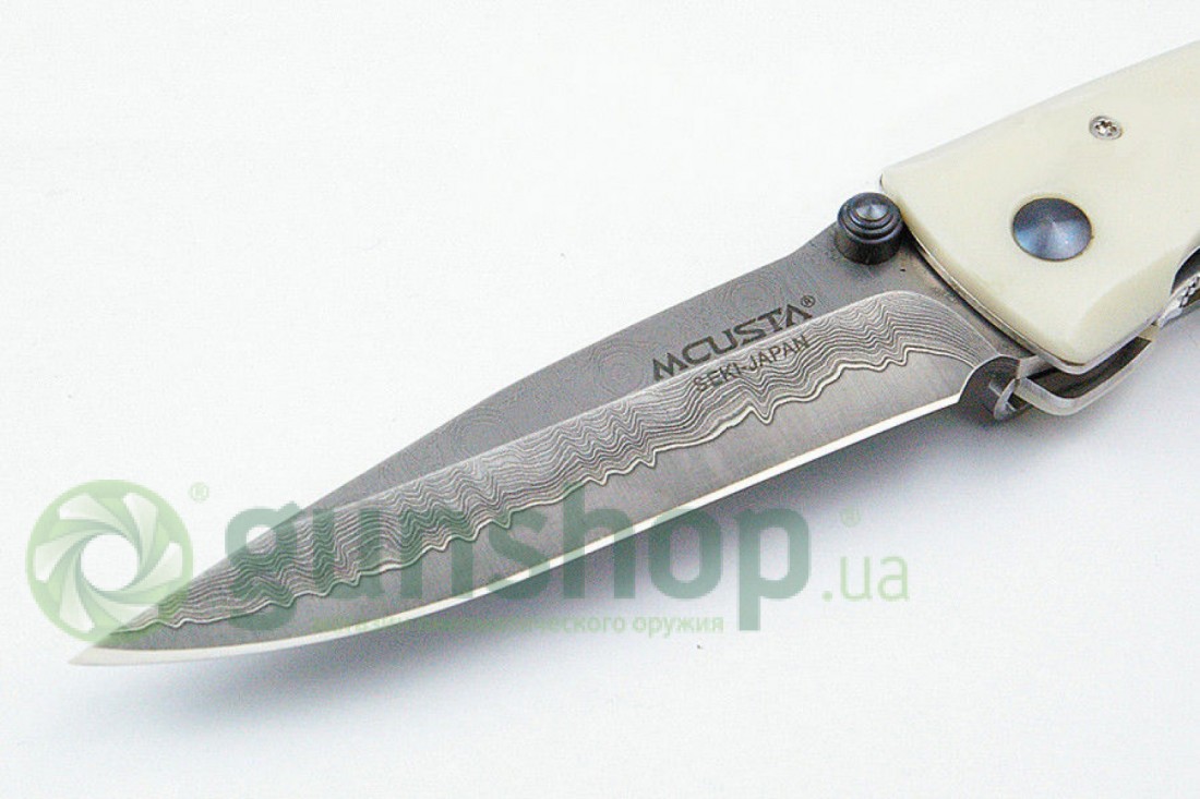 Нож MCUSTA Classic Wave damascus corian Нож MCUSTA Classic Wave damascus corian