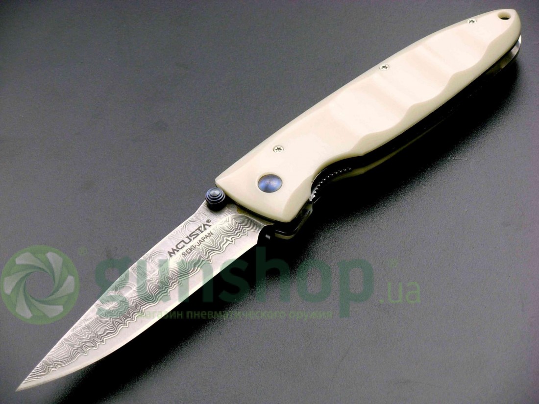 Нож MCUSTA Classic Wave damascus corian Нож MCUSTA Classic Wave damascus corian